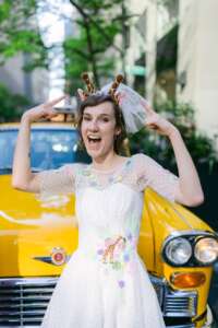 Farmer Katie from White Post farm in her wedding dress. She loves giraffes. 